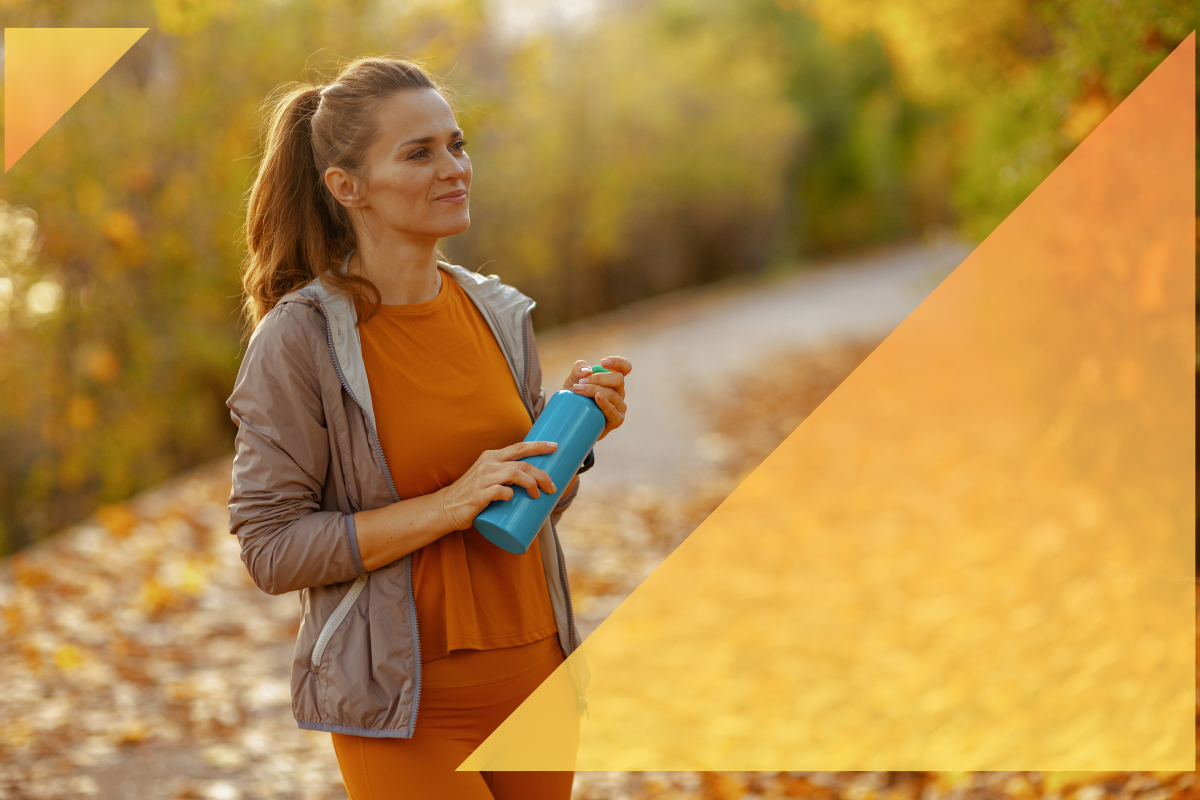 lady walking outside wearing fitness clothes